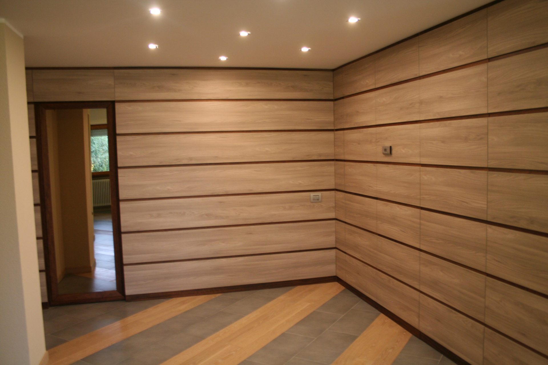 Boiserie in legno a tutta parete — Giovanni Conti Interior Design